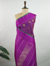 Kanchipuram Silk This magenta pink Oosikattam Kanchipuram saree in pure silk is a burst of vibrant tradition, woven with pure zari and framed with a classic medium border. Bold and joyful, it carries the strength of structure with a softness of hue. A beautiful pick for festive wear and bridal grace. #Manoranjitham #OosikattamWeave #MagentaSilk #HandloomHeritage #TimelessSarees Ambika - Manoranjitham Weaves - Handloom Store