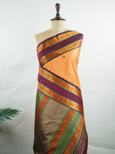 Kanchipuram Silk Orange and purple blend beautifully in this Kanchipuram saree with thread buttis and pure zari, offering medium-border elegance and festive vibrance. #Manoranjitham #ThreadButti #OrangePurpleSilk #KanjivaramCharm #HeritageInThreads Sattvika - Manoranjitham Weaves - Handloom Store