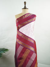 Kanchipuram Silk Radiant pink meets rich maroon in this pure silk Kanjivaram with bold kattan checks. The 2G zari borders glisten with grandeur, making it a favourite for festive occasions. Drapes with a majestic fall, creating a timeless bridal statement.
#PinkSilkSaree #KattanChecks #HandloomHeritage #BridalSilk #Manoranjitham Hamsadhwani - Manoranjitham Weaves - Handloom Store