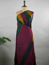Kanchipuram Silk Woven in pure Kanjivaram silk, this saree pairs a deep black body with a rich maroon pallu and matching blouse. The multi temple borders add a subtle rhythm of tradition, lending depth without overpowering the design. A classic composition that speaks through contrast, craftsmanship, and timeless elegance. Kameshi - Manoranjitham Weaves - Handloom Store