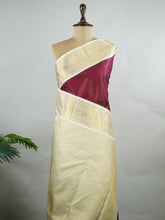 Kanchipuram Silk Pure silk woven in a deep maroon body with zari Vairavoosi stripes.
Paired with a rich cream pallu and matching blouse.
Accented with zari stripes for timeless, understated elegance. Medha - Manoranjitham Weaves - Handloom Store