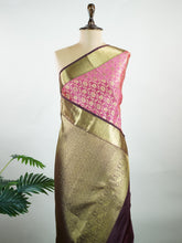 Kanchipuram Silk A masterpiece from Kanchipuram, this Kanjivaram saree in Soft pink is a tribute to India's rich handloom legacy. The Pure Zari weaving and Buttis motifs make it a perfect choice for brides and celebrations. Every thread speaks of elegance, tradition, and the skilled hands that bring this saree to life. Keeravani - Manoranjitham Weaves - Handloom Store