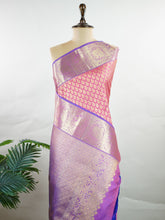 Kanchipuram Silk A masterpiece from Kanchipuram, this Kanjivaram saree in Hot Pink is a tribute to India's rich handloom legacy. The Pure Zari weaving and Buttis motifs make it a perfect choice for brides and celebrations. Every thread speaks of elegance, tradition, and the skilled hands that bring this saree to life. Bhairavi - Manoranjitham Weaves - Handloom Store