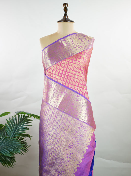 Kanchipuram Silk A masterpiece from Kanchipuram, this Kanjivaram saree in Hot Pink is a tribute to India's rich handloom legacy. The Pure Zari weaving and Buttis motifs make it a perfect choice for brides and celebrations. Every thread speaks of elegance, tradition, and the skilled hands that bring this saree to life. Bhairavi - Manoranjitham Weaves - Handloom Store