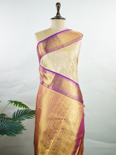 Kanchipuram Silk A masterpiece from Kanchipuram, this Kanjivaram saree in Golden Yellow is a tribute to India's rich handloom legacy. The Pure Zari weaving and Buttis motifs make it a perfect choice for brides and celebrations. Every thread speaks of elegance, tradition, and the skilled hands that bring this saree to life. Latangi - Manoranjitham Weaves - Handloom Store