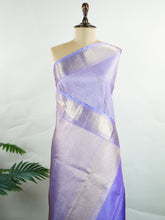 Kanchipuram Silk A masterpiece from Maharashtra, this 100% Pure Silk saree in Orchid Blue is a tribute to India's rich handloom legacy. The Pure Zari weaving and Buttis motifs make it a perfect choice for brides and celebrations. Every thread speaks of elegance, tradition, and the skilled hands that bring this saree to life. Kaunsi - Manoranjitham Weaves - Handloom Store