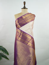 Kanchipuram Silk A soft peach Kanchipuram silk saree adorned with gold zari buttas, exuding subtle grace. The deep burgundy border offers a striking contrast, elevating the timeless beauty of this weave. Woven from 100% pure silk, this saree blends tradition with understated luxury. Ideal for weddings and festive occasions. #ManoranjithamSilks #KanjivaramHandloom #PureSilkSaree #BridalElegance #TimelessTradition Sahana - Manoranjitham Weaves - Handloom Store