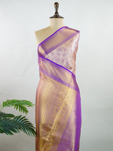 Kanchipuram Silk Soft peach silk meets purple borders, woven with gold and silver zari buttas that shimmer in every glance. This saree blends grace with tradition, perfect for festive moments. Crafted from 100% pure silk, it carries the artistry of timeless handlooms. A drape to cherish forever. #ManoranjithamSilks #KanjivaramHandloom #PureSilkSaree #BridalElegance #TimelessTradition Sindhu - Manoranjitham Weaves - Handloom Store