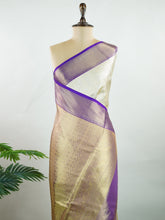 Kanchipuram Silk A classic cream silk saree with purple borders, adorned with delicate zari buttis scattered across the weave. The rich contrast blends tradition with grace. Woven in Kanchipuram from 100% pure silk, it's perfect for weddings and festive occasions. A timeless drape for treasured moments. #ManoranjithamSilks #KanjivaramHandloom #PureSilkSaree #BridalElegance #TimelessTradition Vagadeeshwari - Manoranjitham Weaves - Handloom Store