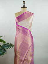 Kanchipuram Silk A subtle mauve silk saree with pink borders, woven with gold and silver zari buttas that shimmer in every fold. The soft hues bring elegance to timeless tradition. Handwoven in Kanchipuram with 100% pure silk, it's perfect for weddings and festive celebrations. A drape that carries beauty across generations. #ManoranjithamSilks #KanjivaramHandloom #PureSilkSaree #BridalElegance #TimelessTradition Jayanthasri - Manoranjitham Weaves - Handloom Store