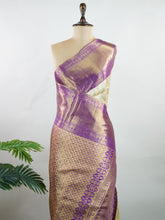 Kanchipuram Silk A timeless treasure for the bride, this pure handloom Kanjivaram saree radiates grandeur with every thread. Woven by master weavers, it carries the weight of tradition and the shimmer of celebration. With its bold zari work and majestic drape, it is crafted to make a bride feel divine on her most special day. An heirloom in the making, steeped in culture and grace. Mukhari - Manoranjitham Weaves - Handloom Store