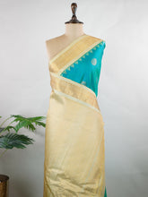 Gadwal Silk Handwoven in Telangana, Gadwal is a pure silk saree celebrated for its lightness, softness that deepens with every use, and its timeless elegance—making it one of the most comfortable and graceful vintage sarees ever woven Chandrika - Manoranjitham Weaves - Handloom Store