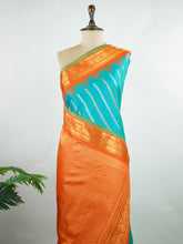 Gadwal Silk Handwoven in Telangana, Gadwal is a pure silk saree celebrated for its lightness, softness that deepens with every use, and its timeless elegance—making it one of the most comfortable and graceful vintage sarees ever woven Ambika - Manoranjitham Weaves - Handloom Store