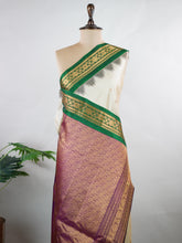 Gadwal Silk Handwoven in Telangana, Gadwal is a pure silk saree celebrated for its lightness, softness that deepens with every use, and its timeless elegance—making it one of the most comfortable and graceful vintage sarees ever woven Dhriti - Manoranjitham Weaves - Handloom Store