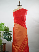 Gadwal Silk This classic Gadwal saree is crafted from 100% pure silk in a vibrant red shade.br
The plain body is adorned with elegant zari buttis, featuring a simple, borderless design for understated sophistication. Perfect for traditional occasions and festive celebrations, it combines timeless elegance with subtle charm. Suryakantam - Red Handloom Gadwal Silk Saree | Pure Silk | Zari Border - Manoranjitham Weaves - Handloom Store