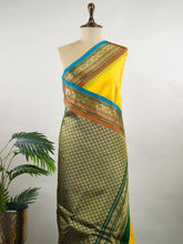 Punyangi – Yellow Handloom Gadwal Silk Saree | Pure Silk | Zari Border