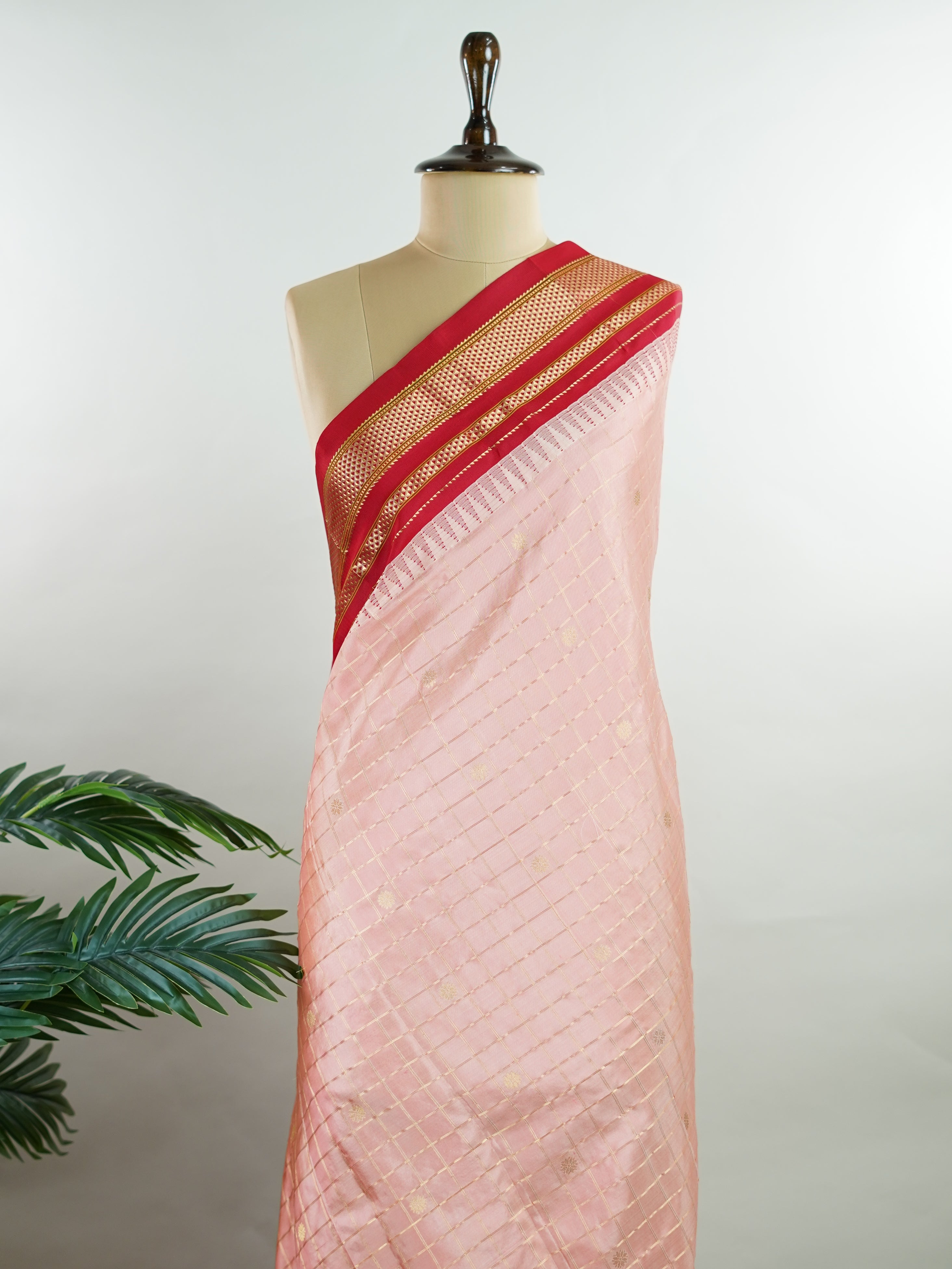 Narayanpet Narayanpet sarees with checks and buttis showcase a perfect blend of tradition and simplicity, featuring intricate motifs woven over classic check patterns.
Their vibrant colors and fine craftsmanship make them elegant choices for any occasion.
Mitra - Manoranjitham Weaves - Handloom Store