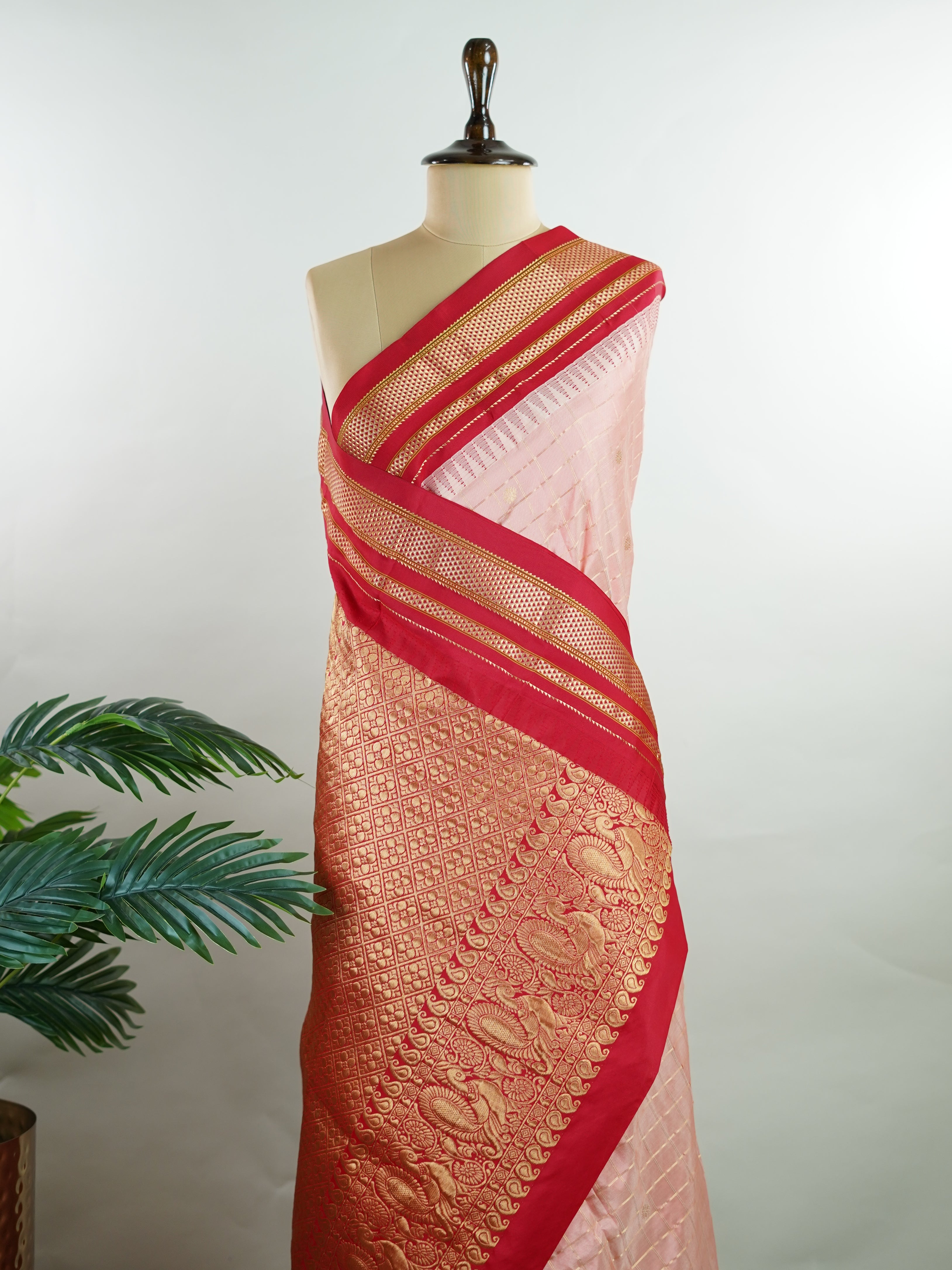 Narayanpet Narayanpet sarees with checks and buttis showcase a perfect blend of tradition and simplicity, featuring intricate motifs woven over classic check patterns.
Their vibrant colors and fine craftsmanship make them elegant choices for any occasion.
Mitra - Manoranjitham Weaves - Handloom Store