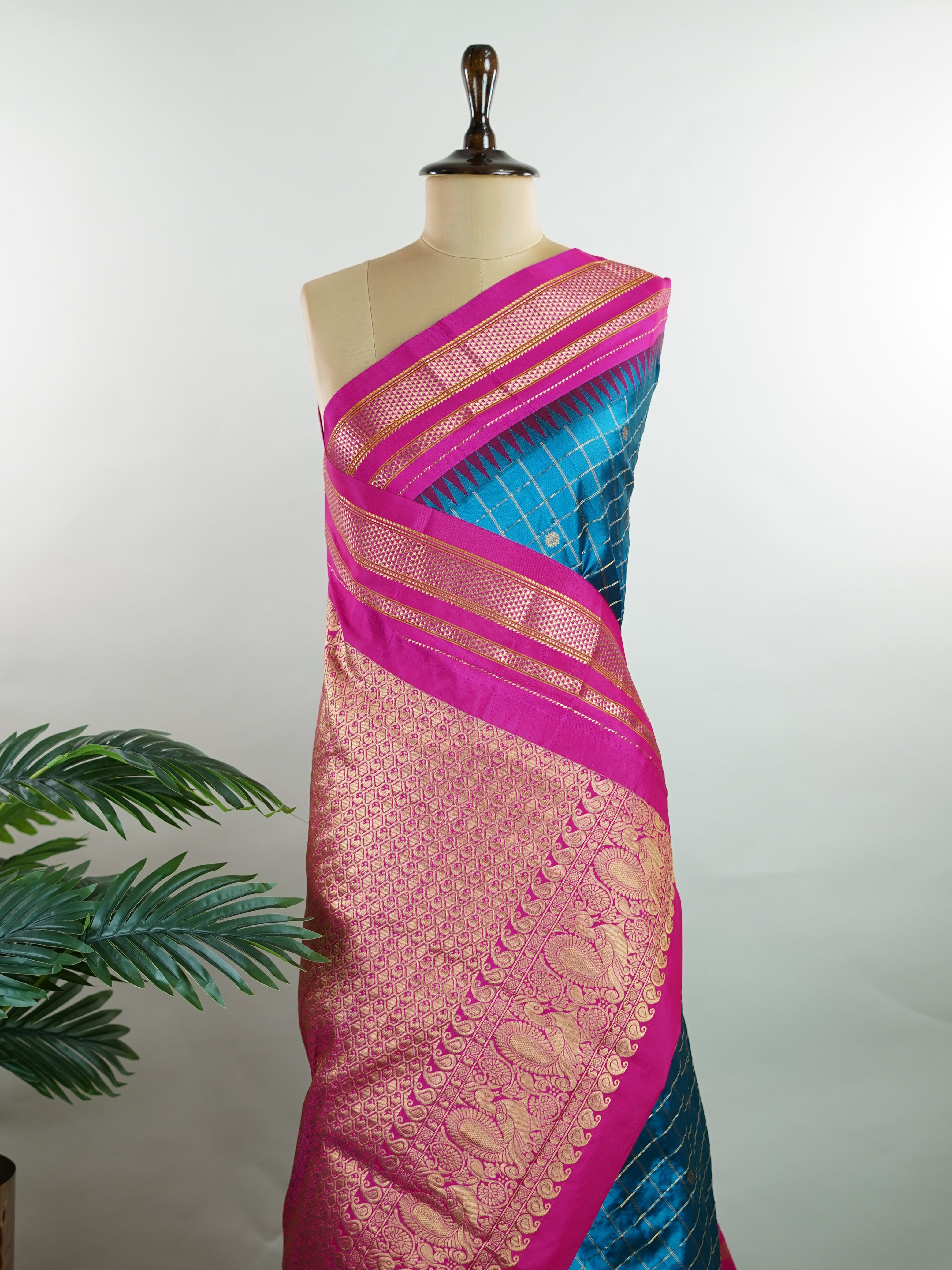 Narayanpet Narayanpet sarees with checks and buttis showcase a perfect blend of tradition and simplicity, featuring intricate motifs woven over classic check patterns.
Their vibrant colors and fine craftsmanship make them elegant choices for any occasion.
Parvati - Manoranjitham Weaves - Handloom Store