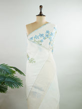 Cottons In soft cream tones, this Kora Cotton saree from Varanasi carries a light, graceful charm.
Floral motifs bloom gently across the body, untouched by zari for a pure, minimal look.
Its airy texture makes it ideal for warm days and easy elegance.
A timeless drape for those who love quiet beauty.
#KoraCotton #FloralSaree #NoZariElegance #VaranasiWeaves #ManoranjithamSarees Chitra - Manoranjitham Weaves - Handloom Store