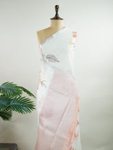 Linen A pristine white base adorned with multicolour floral motifs makes this Silk Kota saree a picture of elegance.
Fine zari threads glint softly through the weave, adding a touch of celebration.
Light as air and beautifully translucent, it’s ideal for summer occasions.
A delicate dance of tradition and colour from Varanasi.
#SilkKota #FloralElegance #WhiteSareeCharm #FineZariWeave #ManoranjithamSarees
Adana - Manoranjitham Weaves - Handloom Store