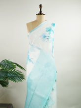 Linen A pristine white base adorned with multicolour floral motifs makes this Silk Kota saree a picture of elegance.
Fine zari threads glint softly through the weave, adding a touch of celebration.
Light as air and beautifully translucent, it’s ideal for summer occasions.
A delicate dance of tradition and colour from Varanasi.
#SilkKota #FloralElegance #WhiteSareeCharm #FineZariWeave #ManoranjithamSarees
Bhairavam - Manoranjitham Weaves - Handloom Store