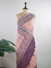 Kota A breezy Cotton Kota Doria saree adorned with delicate handblock prints and glistening mirror work—light as air, rich in tradition.
Its translucent texture and airy drape make it perfect for summer gatherings and everyday grace.
Every motif is stamped by hand, reflecting the charm of slow craft and timeless elegance.
#HandloomCotton #KotaDoria #BlockPrintSaree #MirrorWork #Manoranjitham
Chalanata - Manoranjitham Weaves - Handloom Store
