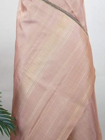Kanchipuram Silk Crafted in 100% pure silk, this plain Kanchipuram saree with pure zari and a borderless silhouette radiates understated bridal elegance. #Manoranjitham #KanjivaramSilk #PureZari #HandloomHeritage #TimelessWeaves Pamasundari - Manoranjitham Weaves - Handloom Store