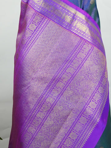 Kanchipuram Silk A bright blue saree in pure silk with pink accents, this Kanchipuram Oosikattam weave is completed with a medium border and pure zari shimmer. Traditional checks meet vibrant colours in this versatile festive drape. Handwoven with precision at Manoranjitham. #Manoranjitham #OosikattamSilk #KanjivaramTradition #ColourAndCraft #SilkWithSoul Saraswathi - Manoranjitham Weaves - Handloom Store