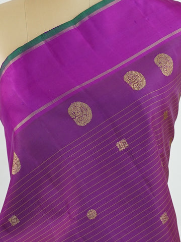 Kanchipuram Silk This magenta pink Oosikattam Kanchipuram saree in pure silk is a burst of vibrant tradition, woven with pure zari and framed with a classic medium border. Bold and joyful, it carries the strength of structure with a softness of hue. A beautiful pick for festive wear and bridal grace. #Manoranjitham #OosikattamWeave #MagentaSilk #HandloomHeritage #TimelessSarees Ambika - Manoranjitham Weaves - Handloom Store