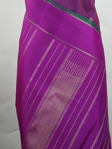Kanchipuram Silk This magenta pink Oosikattam Kanchipuram saree in pure silk is a burst of vibrant tradition, woven with pure zari and framed with a classic medium border. Bold and joyful, it carries the strength of structure with a softness of hue. A beautiful pick for festive wear and bridal grace. #Manoranjitham #OosikattamWeave #MagentaSilk #HandloomHeritage #TimelessSarees Ambika - Manoranjitham Weaves - Handloom Store