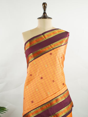 Kanchipuram Silk Orange and purple blend beautifully in this Kanchipuram saree with thread buttis and pure zari, offering medium-border elegance and festive vibrance. #Manoranjitham #ThreadButti #OrangePurpleSilk #KanjivaramCharm #HeritageInThreads Sattvika - Manoranjitham Weaves - Handloom Store