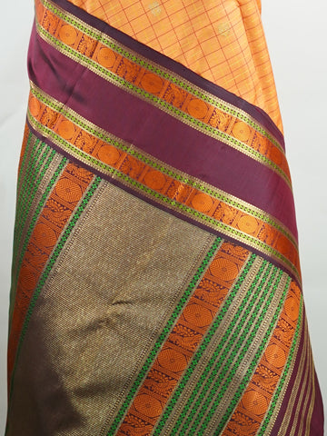 Kanchipuram Silk Orange and purple blend beautifully in this Kanchipuram saree with thread buttis and pure zari, offering medium-border elegance and festive vibrance. #Manoranjitham #ThreadButti #OrangePurpleSilk #KanjivaramCharm #HeritageInThreads Sattvika - Manoranjitham Weaves - Handloom Store