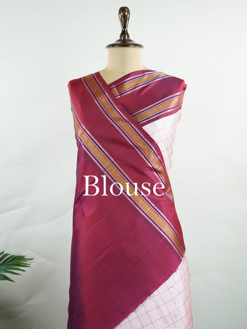 Kanchipuram Silk Radiant pink meets rich maroon in this pure silk Kanjivaram with bold kattan checks. The 2G zari borders glisten with grandeur, making it a favourite for festive occasions. Drapes with a majestic fall, creating a timeless bridal statement.
#PinkSilkSaree #KattanChecks #HandloomHeritage #BridalSilk #Manoranjitham Hamsadhwani - Manoranjitham Weaves - Handloom Store