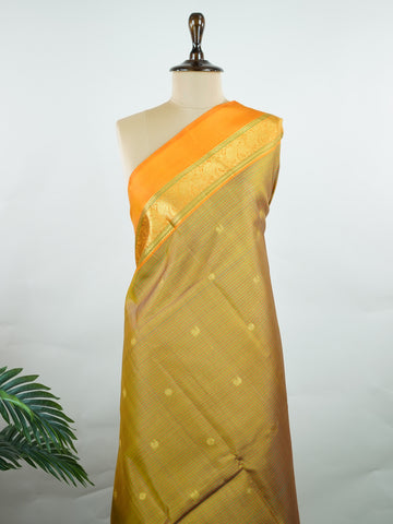 Kanchipuram Silk A rare Viraoosi pattern in lush green silk, brought alive with vibrant orange borders. The 2G zari adds a royal glimmer, making it perfect for traditional ceremonies. A true collector’s piece for those who value unique handloom artistry.
#ViraoosiSaree #GreenSilk #HandloomHeritage #PureSilkSaree #Manoranjitham Kamavardhini - Manoranjitham Weaves - Handloom Store