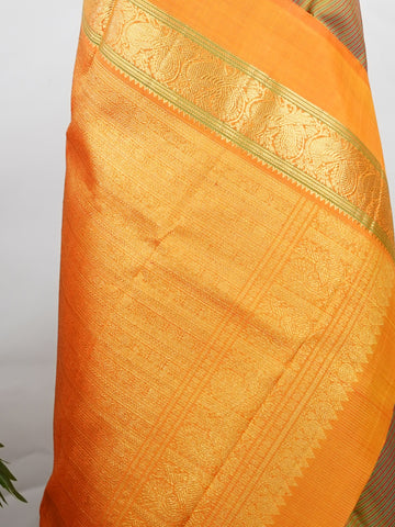 Kanchipuram Silk A rare Viraoosi pattern in lush green silk, brought alive with vibrant orange borders. The 2G zari adds a royal glimmer, making it perfect for traditional ceremonies. A true collector’s piece for those who value unique handloom artistry.
#ViraoosiSaree #GreenSilk #HandloomHeritage #PureSilkSaree #Manoranjitham Kamavardhini - Manoranjitham Weaves - Handloom Store