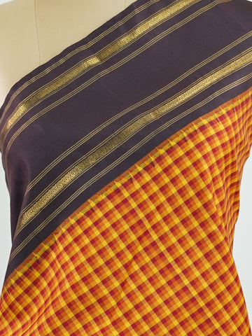 Kanchipuram Silk A lively mix of multi-colours balanced with earthy snuff brown borders in classic kattan checks. Woven in pure silk with rich zari, it’s a drape that blends vibrance with grounded elegance. Ideal for day-long functions and festive gatherings.
#KattanChecks #MultiColourSaree #PureSilkWeaves #TraditionalSilk #Manoranjitham Lalitha - Manoranjitham Weaves - Handloom Store