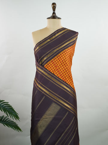 Kanchipuram Silk A lively mix of multi-colours balanced with earthy snuff brown borders in classic kattan checks. Woven in pure silk with rich zari, it’s a drape that blends vibrance with grounded elegance. Ideal for day-long functions and festive gatherings.
#KattanChecks #MultiColourSaree #PureSilkWeaves #TraditionalSilk #Manoranjitham Lalitha - Manoranjitham Weaves - Handloom Store