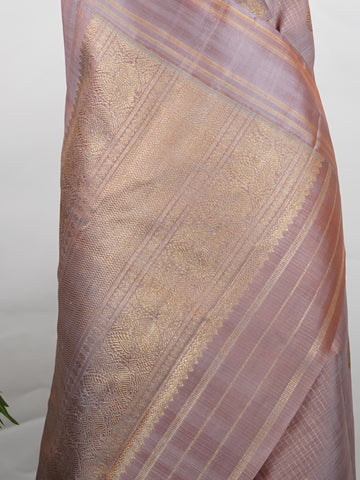 Kanchipuram Silk Earthy elegance meets intricate artistry in this light brown Kanjivaram. Oosikattam patterns and tiny buttas add texture to the soft sheen of silk. Ideal for cultural events and sacred celebrations. A classic drape for women who value understated heritage. #LightBrownSilk #OosikattamWeave #PureZari #HandloomBeauty Kedaragaula - Manoranjitham Weaves - Handloom Store