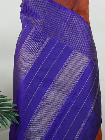 Kanchipuram Silk Rich brown silk meets regal purple in this Oosikattam masterpiece. The zari buttas sparkle subtly, adding festive warmth. Ideal for heritage celebrations and grand gatherings. A drape woven to command admiration. #BrownPurpleSilk #OosikattamDesign #PureZari #LuxuryTradition Suryakantham - Manoranjitham Weaves - Handloom Store