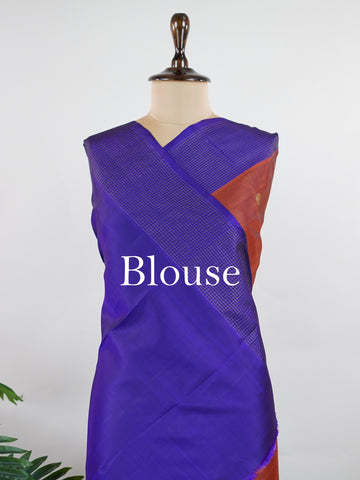 Kanchipuram Silk Rich brown silk meets regal purple in this Oosikattam masterpiece. The zari buttas sparkle subtly, adding festive warmth. Ideal for heritage celebrations and grand gatherings. A drape woven to command admiration. #BrownPurpleSilk #OosikattamDesign #PureZari #LuxuryTradition Suryakantham - Manoranjitham Weaves - Handloom Store