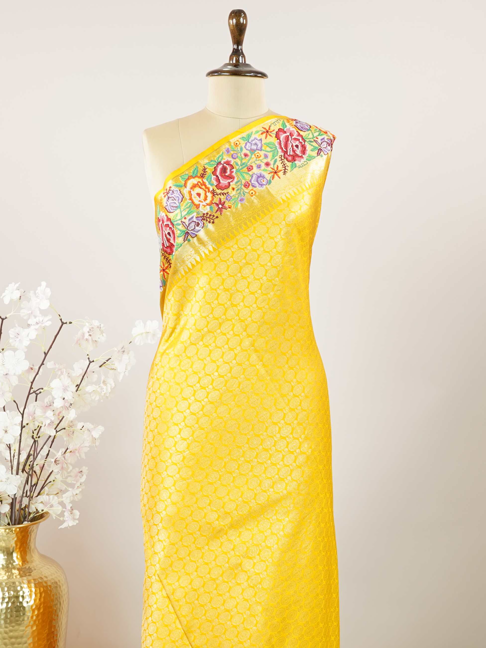Kanchipuram Silk A royal Kanjivaram meets delicate Petit Point embroidery, where heritage and handcraft unite.br
Every drape carries centuries of tradition adorned with timeless artistry. MahaVidya - Handwork Embroidered Silk Saree | Parsigara Embroidery - Manoranjitham Weaves - Handloom Store