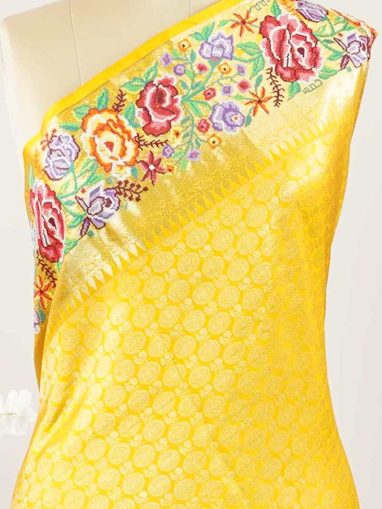 Kanchipuram Silk A royal Kanjivaram meets delicate Petit Point embroidery, where heritage and handcraft unite.br
Every drape carries centuries of tradition adorned with timeless artistry. MahaVidya - Handwork Embroidered Silk Saree | Parsigara Embroidery - Manoranjitham Weaves - Handloom Store