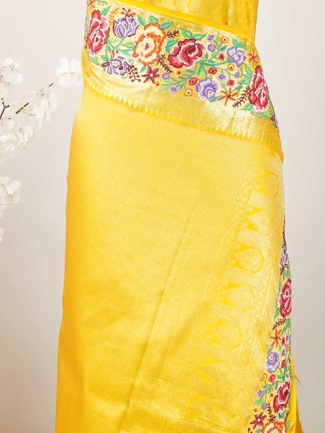 Kanchipuram Silk A royal Kanjivaram meets delicate Petit Point embroidery, where heritage and handcraft unite.br
Every drape carries centuries of tradition adorned with timeless artistry. MahaVidya - Handwork Embroidered Silk Saree | Parsigara Embroidery - Manoranjitham Weaves - Handloom Store