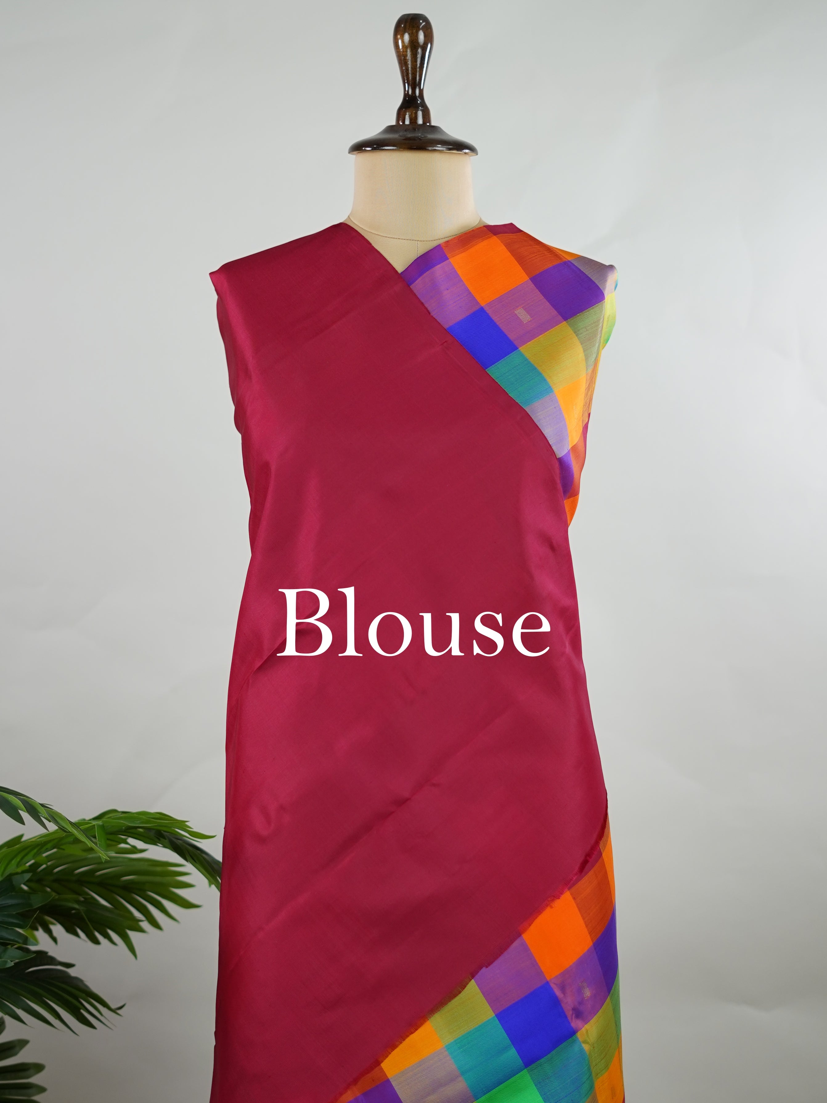 Kanchipuram Silk Borderless handloom Kanjivaram with multicolour checks and delicate buttis throughout.br
Complemented by a rich maroon pallu and blouse in pure zari, giving it a timeless vintage elegance. Kamakalatmika - Multicolour Pure Kanjivaram Silk Saree | Woven Buttas - Manoranjitham Weaves - Handloom Store