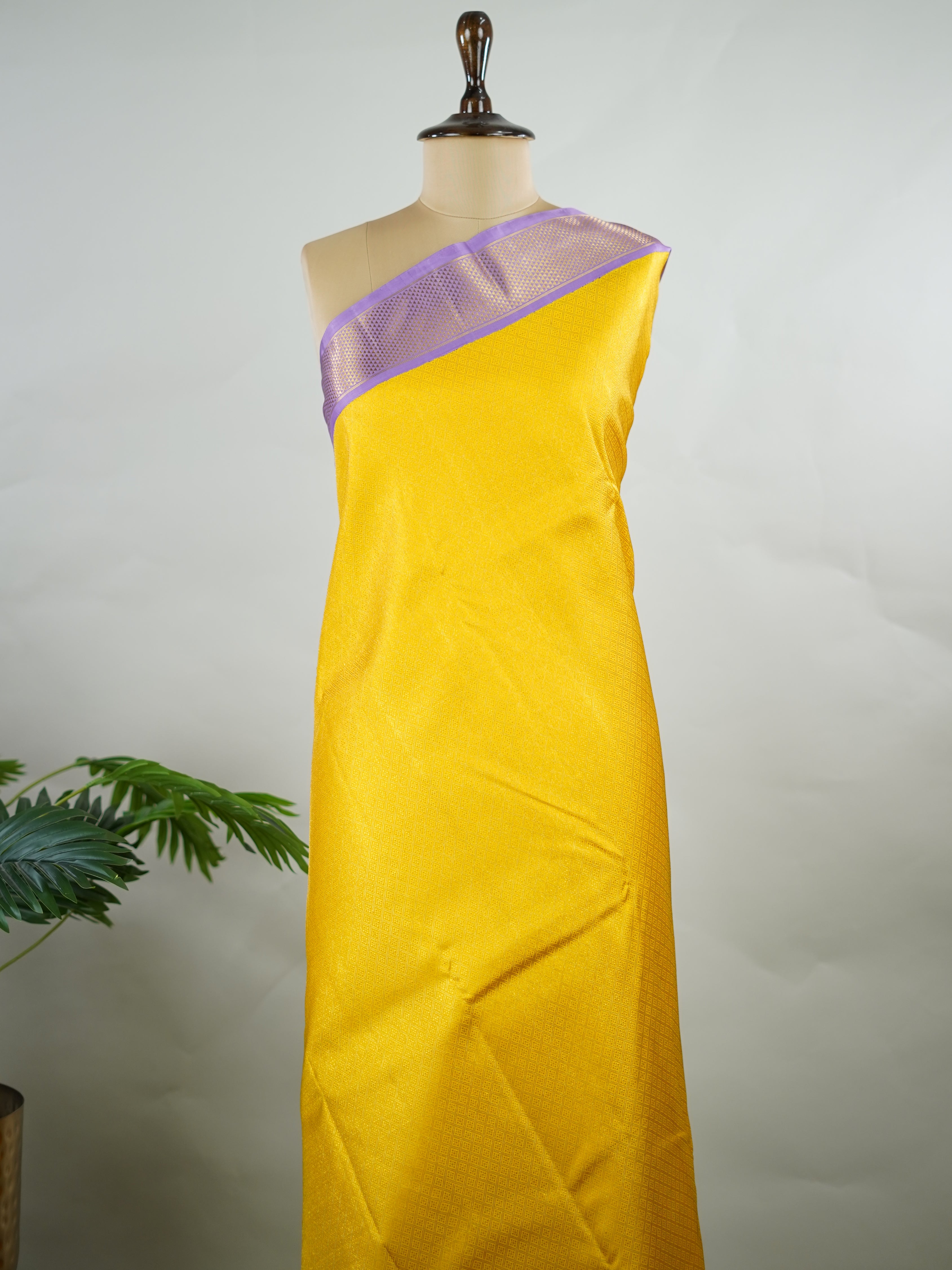Kanchipuram Silk Yellow brocade Kanjivaram body paired with a delicate lavender kaddi border.
A contemporary colour combination that feels rich, modern, and effortlessly graceful. Guptayogini - Manoranjitham Weaves - Handloom Store