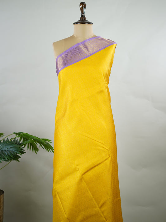 Kanchipuram Silk Yellow brocade Kanjivaram body paired with a delicate lavender kaddi border.
A contemporary colour combination that feels rich, modern, and effortlessly graceful. Guptayogini - Manoranjitham Weaves - Handloom Store