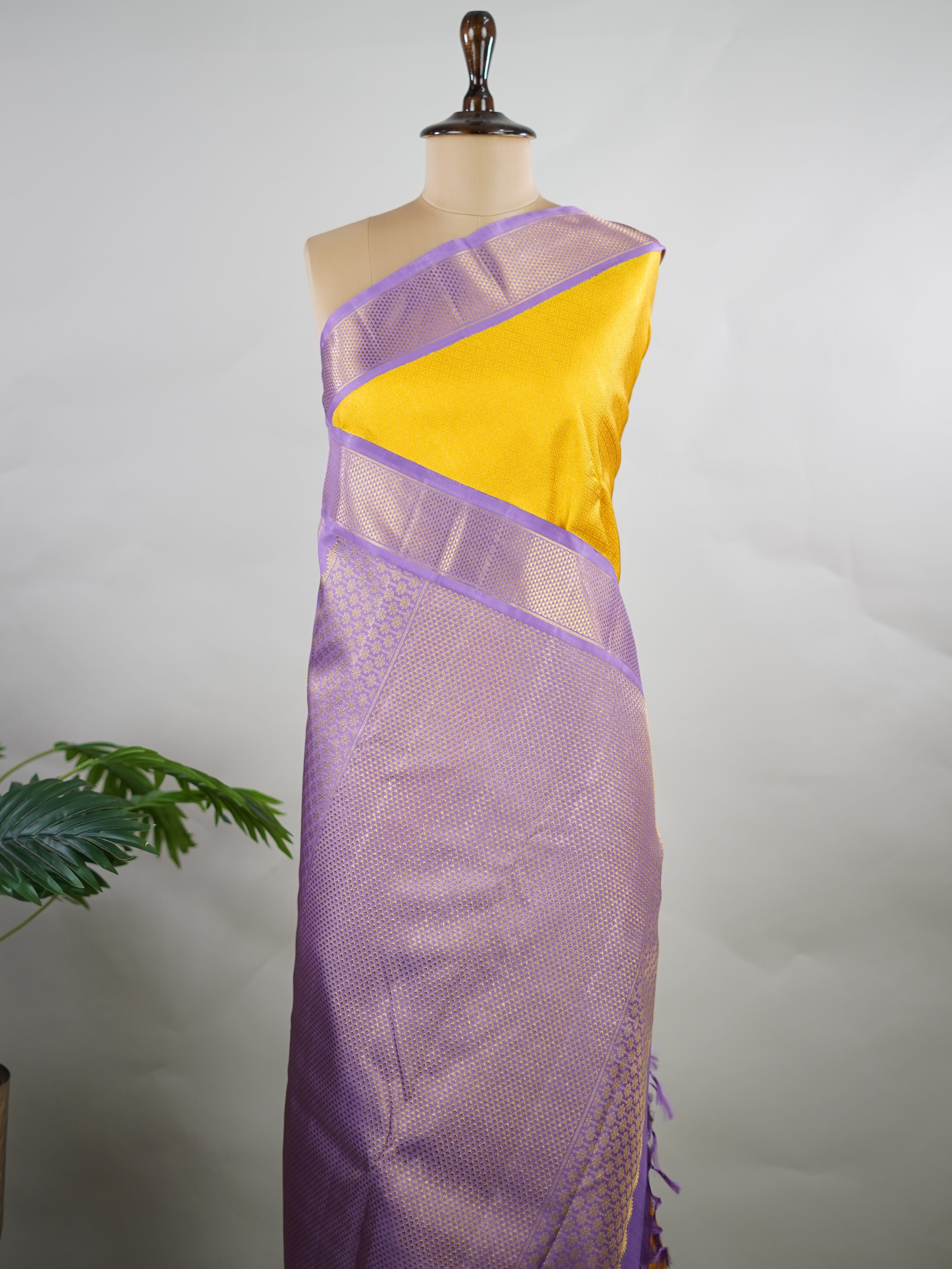 Kanchipuram Silk Yellow brocade Kanjivaram body paired with a delicate lavender kaddi border.
A contemporary colour combination that feels rich, modern, and effortlessly graceful. Guptayogini - Manoranjitham Weaves - Handloom Store