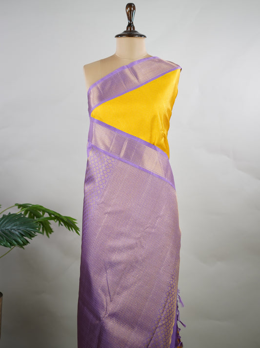 Kanchipuram Silk Yellow brocade Kanjivaram body paired with a delicate lavender kaddi border.
A contemporary colour combination that feels rich, modern, and effortlessly graceful. Guptayogini - Manoranjitham Weaves - Handloom Store
