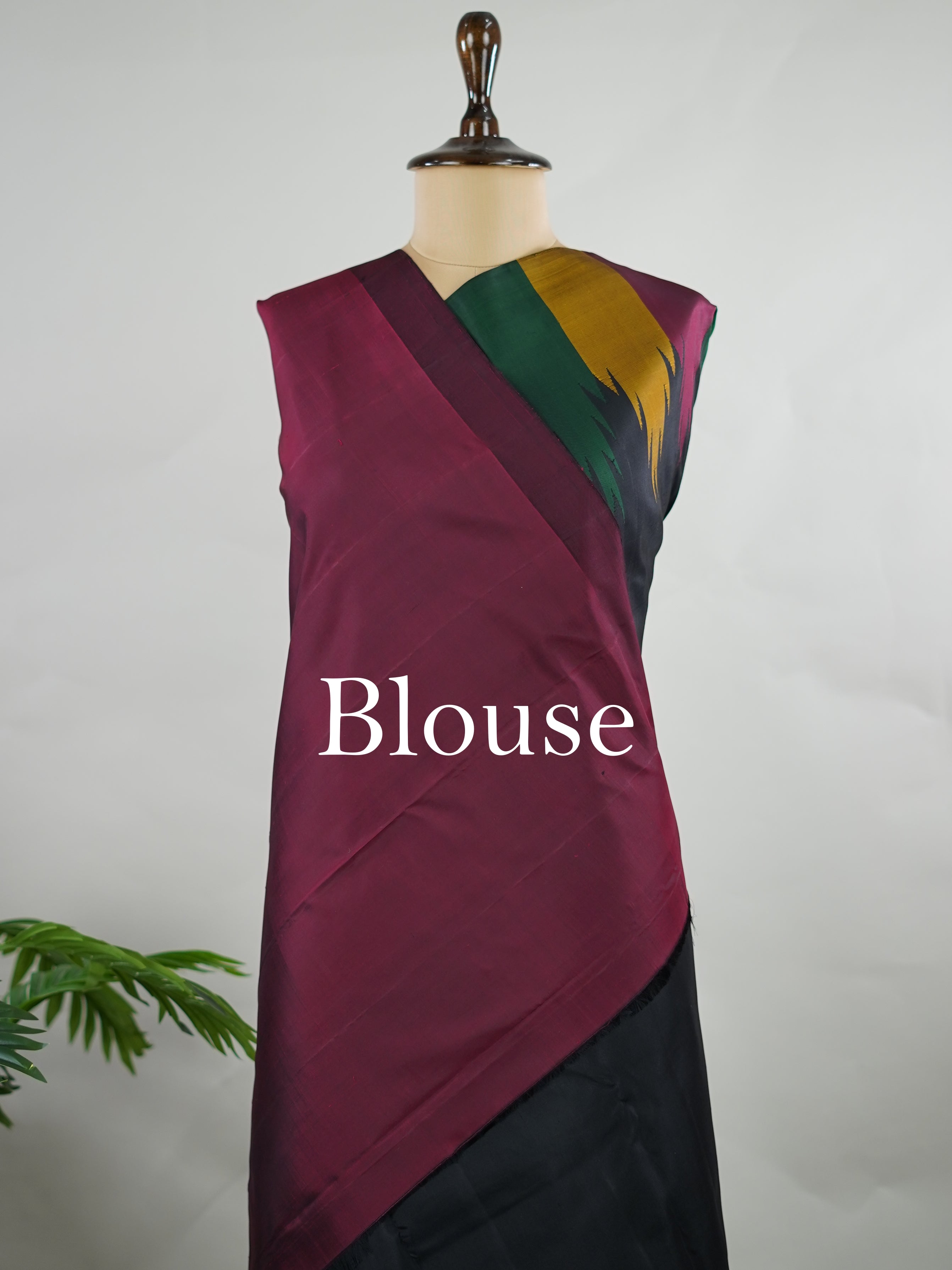 Kanchipuram Silk Woven in pure Kanjivaram silk, this saree pairs a deep black body with a rich maroon pallu and matching blouse. The multi temple borders add a subtle rhythm of tradition, lending depth without overpowering the design. A classic composition that speaks through contrast, craftsmanship, and timeless elegance. Kameshi - Black Pure Kanjivaram Silk Saree - Manoranjitham Weaves - Handloom Store